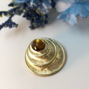 Gold Tone and Amber coloured oval cabochon brooch and pendant